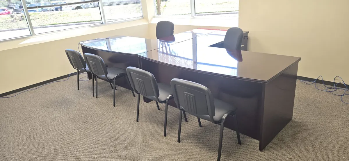 Executive office with dark desk, file storage and task chair
