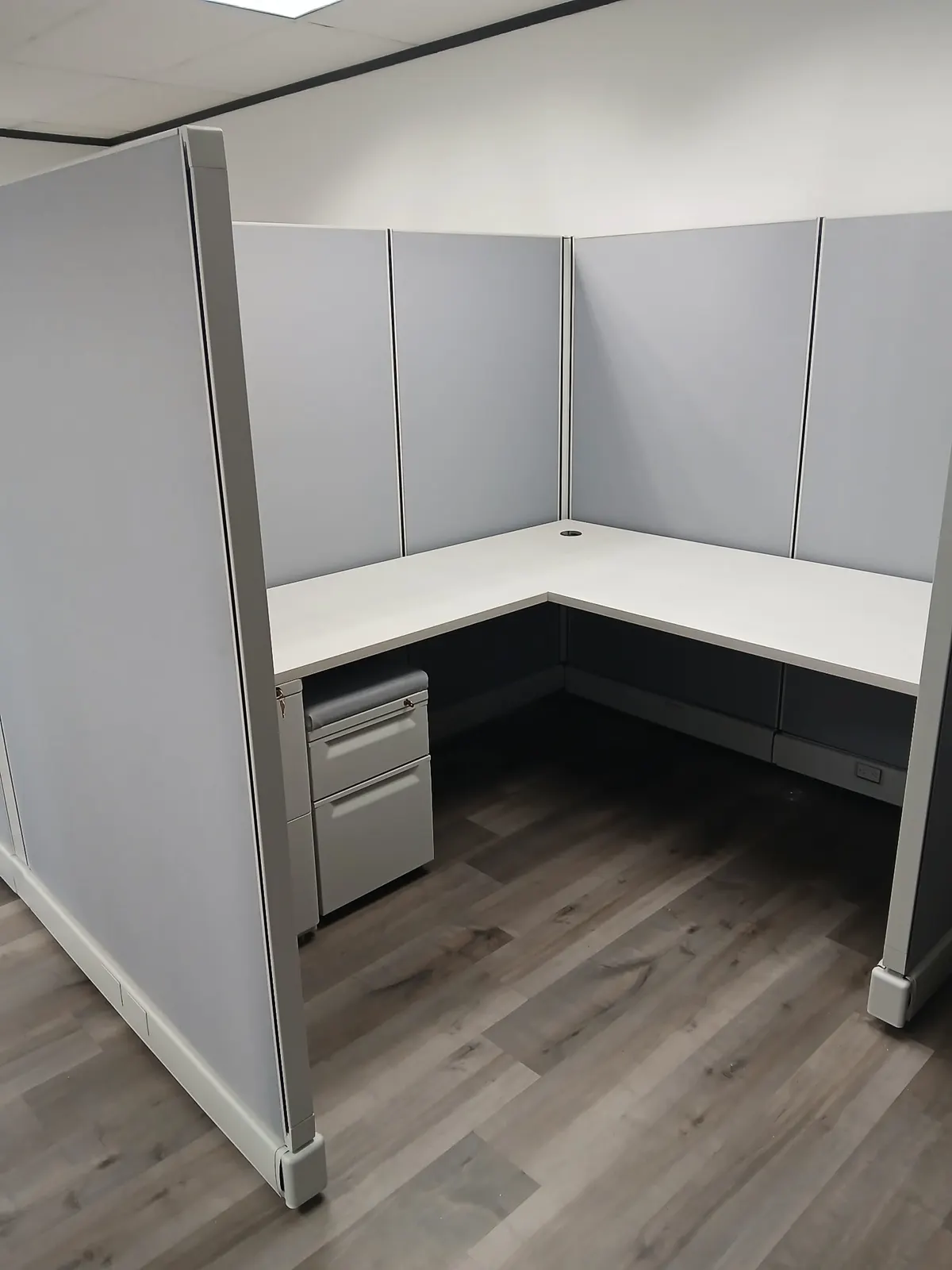 Row of Herman Miller AO2 workstations with task chairs